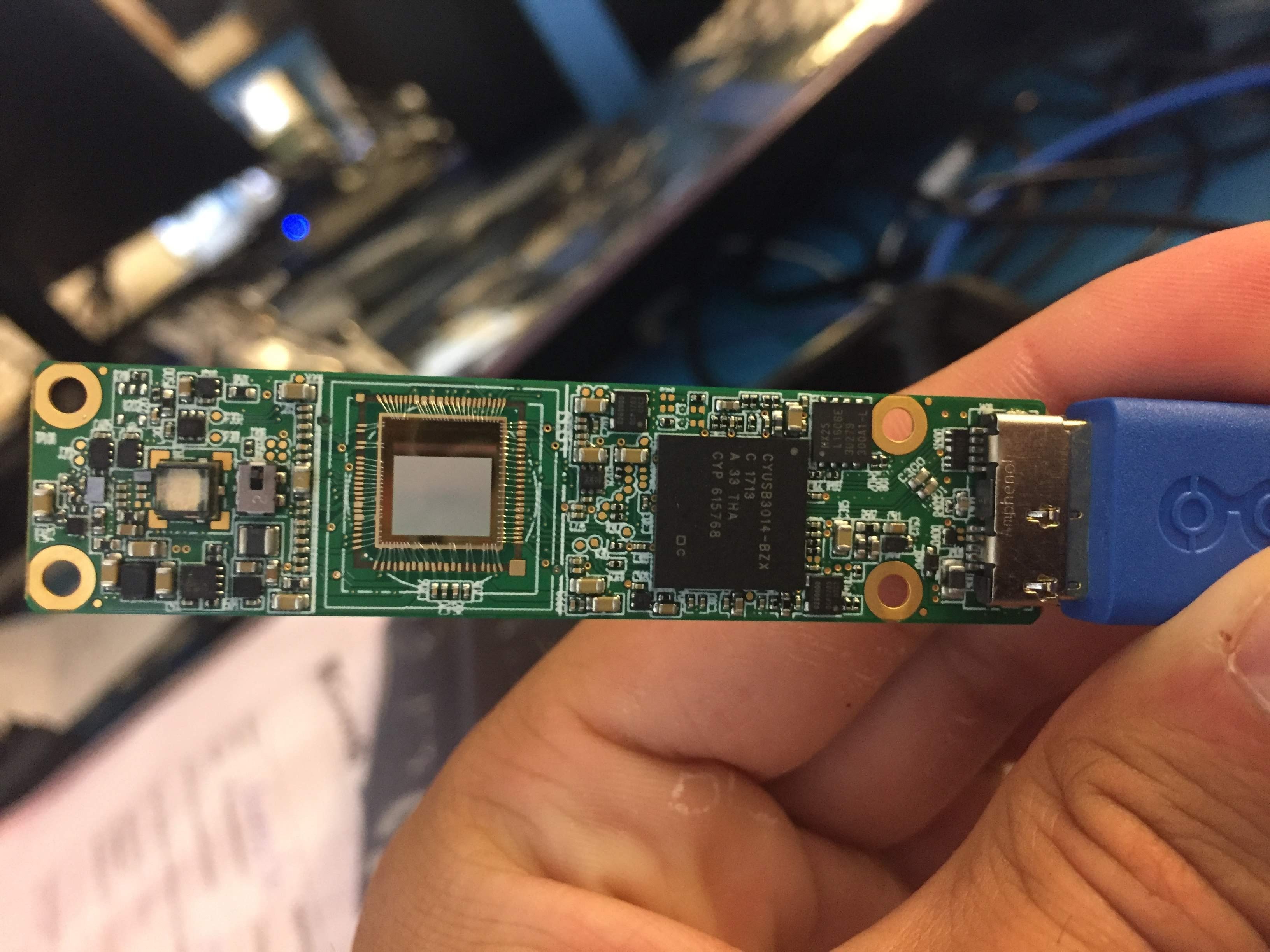 Hand holding time-of-flight camera printed circuit board